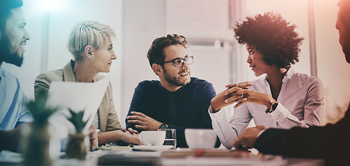 Image showing Business team, meeting and collaboration with diversity and colorful lights with teamwork in office. Communication, workforce and creative group together with planning and professional discussion