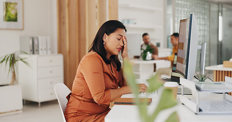 Image showing Business woman, headache and stress on computer of marketing mistake, research fatigue and website fail or error. Tired worker or employee with depression, pain or sad for company social media crisis