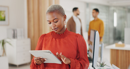Image showing Professional black woman, tablet or designer typing, scroll and work on webdesign, app development or application research. Analysis, network connection or African person review online website design