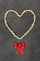 Image showing Festive Christmas Gold Heart Wreath and Red Bow