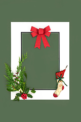 Image showing Christmas Eve Background Frame with Stocking Flora and Red Bow