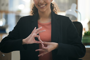 Image showing Hand gesture, corporate and woman at work for communication, sign language or working. Smile, office and employee, person or worker gesturing for conversation, talking or connection in the workplace