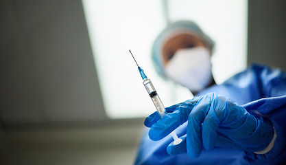 Image showing Needle in hand, medicine and doctor person, healthcare and low angle with closeup, surgeon and anesthesia. Mockup space, syringe and gloves for safety, hospital and surgery with medical professional