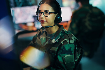 Image showing Army command center, computer and woman in headset, global surveillance and tech for communication. Security, intelligence and soldier at desk in military office at government cyber data control room