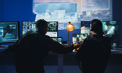 Image showing Army control room, computer and team in surveillance, help and collaboration in tech communication from back. Security, satellite map and man with woman at monitor in military office command center.
