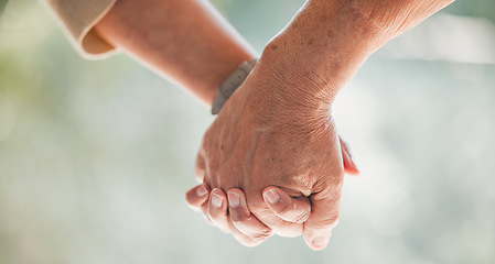 Image showing Holding hands, support and senior couple with love, care and trust together with hope for health in a home. Romance, bonding and elderly people with kindness and solidarity on retirement date