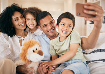 Image showing Family, home selfie and living room with a smile, mom and child together with love. Bonding, sofa and happy father with a young children and mother with photo for social media post with kids at house