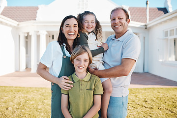 Image showing Happy family, portrait and real estate in new home, property or investment on outdoor grass or lawn. Mother, father and kids smile for moving in, house or bonding in happiness or embrace together