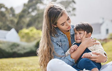 Image showing Outdoor, mother and kid crying, sad and comfort with pain, injury and support with unhappy expression. Family, mama and child in a backyard, upset and compassion with care, console and depression