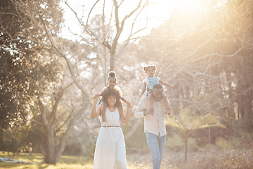 Image showing Parents with children in woods, piggy back and walking for love, bonding or peace in nature together. Mother, father and kids on shoulders in garden, black family on summer weekend in park or forrest