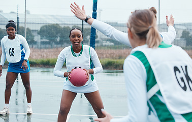 Image showing Netball, sports and team with ball and women in community competition, practice and play outdoor game. Fitness, collaboration or group workout, player tournament or athlete training on court