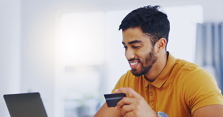 Image showing Credit card, smile and business man with laptop in office for online shopping, digital banking or payment. Computer, ecommerce and happy male professional on internet for sales, finance and fintech.