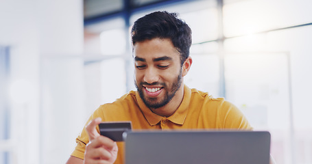 Image showing Credit card, happy and business man with laptop in office for online shopping, digital banking or payment. Computer, ecommerce and smile of male professional on internet for sales, finance or fintech