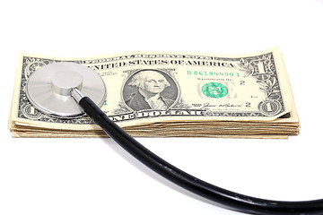 Image showing stethoscope and dollars