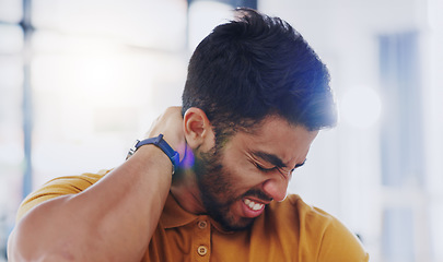 Image showing Laptop, neck pain and business man with injury in office workplace while working alone. Spine problem, arthritis and professional person with fibromyalgia, scoliosis or burnout, tired or backache.