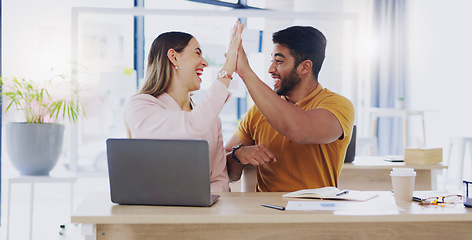 Image showing Creative business people, laptop and high five for winning, success or planning together in teamwork at office. Happy man and woman touching hands on touchscreen for team collaboration or achievement