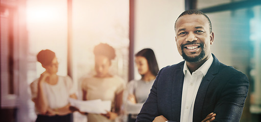 Image showing Business man, smile and portrait with leadership, working and work confidence in a office. African male professional, manager and happy worker in a corporate workplace with arms crossed and staff