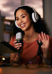 Image showing Woman, headphones and mic, radio DJ or podcast with press journalist and live internet broadcast at night. Happy, tech and multimedia, communication and social media streamer with content creation