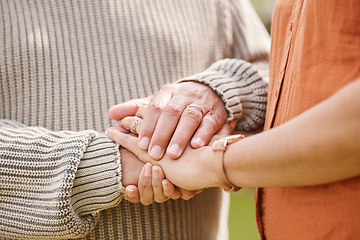 Image showing Couple, love and holding hands with trust, hope or support for bad news, cancer or death comfort closeup. Zoom, empathy and people together for understanding, compassion or kindness, security or care