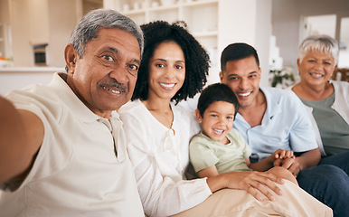 Image showing Family, selfie and grandparents with a smile at home together with young child and mom. Bonding, sofa and happy father with young boy and senior people with photo for social media with kid on couch