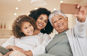 Image showing Family, selfie and living room with a grandmother, mom and child together with love and care. Bonding, sofa and happy mother with young girl and senior woman with photo for social media with kid