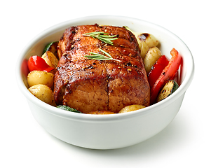 Image showing bowl of whole roast pork and vegetables