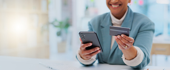 Image showing Credit card, payment and phone with hands of woman in office for fintech, online shopping an investment. Ecommerce, savings and banking app with closeup of employee for business, website and finance