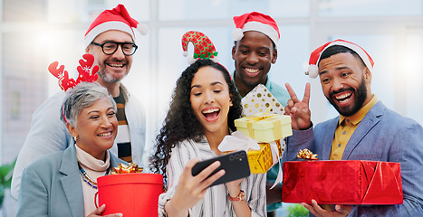 Image showing Creative group, Christmas and selfie for party celebration, festive season or December holiday at office. Happy people or employees smile at work event for gifts, surprise or photo in memory and vlog