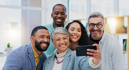 Image showing Happy creative group, selfie and team building in meeting for photo, memory or vlog at the office. Goofy, silly or humor people in teamwork with smile for funny picture or social media at business wo