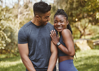 Image showing Fitness, park and portrait of couple hug outdoors for exercise, training and running for cardio workout. Dating, happy and interracial man and woman smile for wellness, health and sports in nature