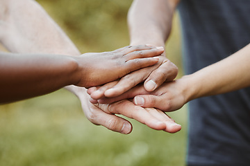 Image showing Hands together, closeup and support with team of people outdoor, help and mission with strategy. Huddle, collaboration or partnership with solidarity, trust in community with goals and friends