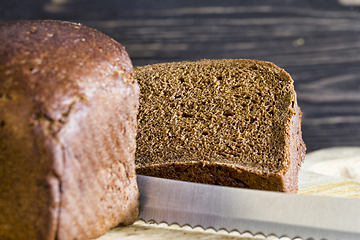 Image showing loaf of bread, sliced