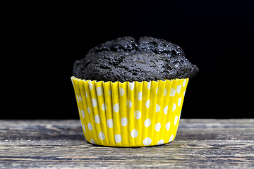 Image showing unusual black cupcake close-up