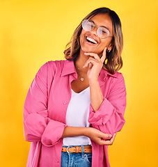 Image showing Happy, laugh and face of woman on yellow background with smile, laughter and cheerful. Fashion, style and isolated person with funny joke in trendy clothes, stylish outfit and glasses in studio