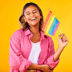 Image showing Happy woman, pride and flag with rainbow and LGBTQ community in studio, equality and celebration on yellow background. Freedom to love, support with lesbian or ally, gen z student with gay identity