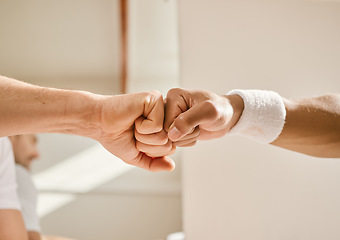 Image showing Fitness, hands and fist bump by men friends at indoor tennis court for support, motivation or training closeup. Zoom, emoji and people with sports deal, workout or partnership agreement or solidarity