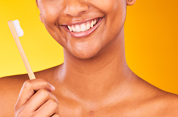 Image showing Woman, smile and closeup for dental, toothbrush and teeth for health, happy and hygiene by studio background. Person, treatment and whitening or clean, oral and brushing teeth for wellness in mouth