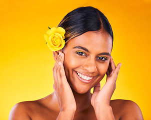 Image showing Makeup, flower and portrait of woman in studio with beauty, glow and cosmetic face routine. Skincare, rose and young female model from Mexico with facial treatment isolated by yellow background.