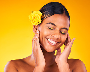 Image showing Cosmetic, flower and young woman in studio with beauty, glow and skincare face routine. Makeup, rose and female model from Mexico with facial dermatology treatment isolated by yellow background.