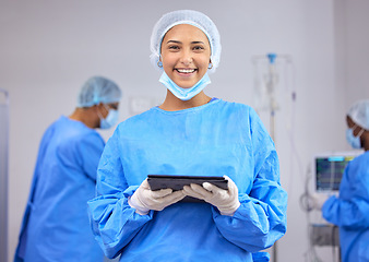 Image showing Doctor, woman in portrait with tablet in surgery and operation room, healthcare and digital treatment plan. Smile, help and wellness with surgeon and medical care, online health record at hospital