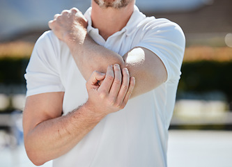 Image showing Elbow, pain and person with injury, fitness and athlete outdoor, medical emergency and joint inflammation. Health, wellness and hands holding arm outdoor, sport accident and anatomy with fibromyalgia