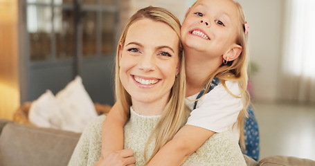 Image showing Portrait, hug and mother with girl child on a sofa with care, happy and bond in family home. Smile, face and mom with cute kid in a living room relax with love, trust and support or piggyback games