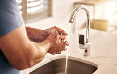 Image showing Closeup, water and washing hands in bathroom for hygiene, wellness or disinfection for health. Soap, man and cleaning skin to remove bacteria, virus germs and dirt for safety or protection in home