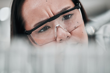 Image showing Test tubes, scientist and confused woman closeup with investigation, thinking and science research. Laboratory, clinic professional and healthcare worker with medicine and liquid check for test