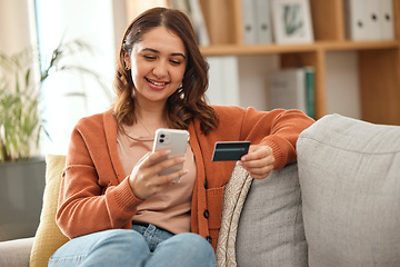 Image showing Home, woman and cellphone with credit card, online shopping and investment in a lounge. Person, girl and consumer on a sofa, smartphone and banking with payment, finance and ecommerce with budget