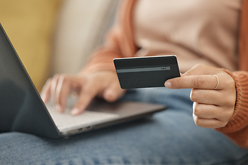 Image showing Closeup, woman and laptop with credit card, online shopping and transaction in a lounge. Person, home and girl on a sofa, pc or digital app with payment, banking and budget with fintech or investment