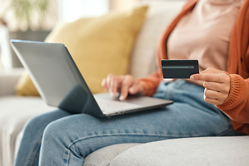 Image showing Closeup, woman and laptop with credit card, ecommerce and fintech with transaction, payment and digital app in a lounge. Person, home or girl on a sofa, pc or finance with online shopping and savings