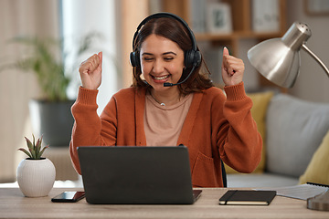 Image showing Happy woman, laptop and fist pump in call center, celebration or winning promotion in remote work at home. Excited female person, consultant or agent freelancer smile for discount, sale or target