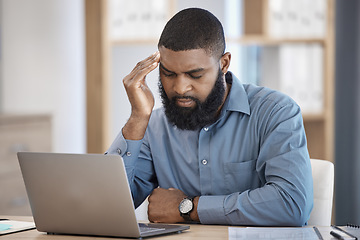 Image showing Business man, headache and tired on laptop of stock market risk, financial mistake or thinking of bad investment. African trader with depression, stress or confused for trading decision in his office