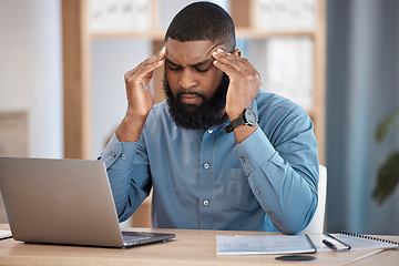 Image showing Business man, headache and stress on laptop for stock market crash, financial mistake or bad investment. Tired african trader with depression, pain or confused for trading decision or office crisis